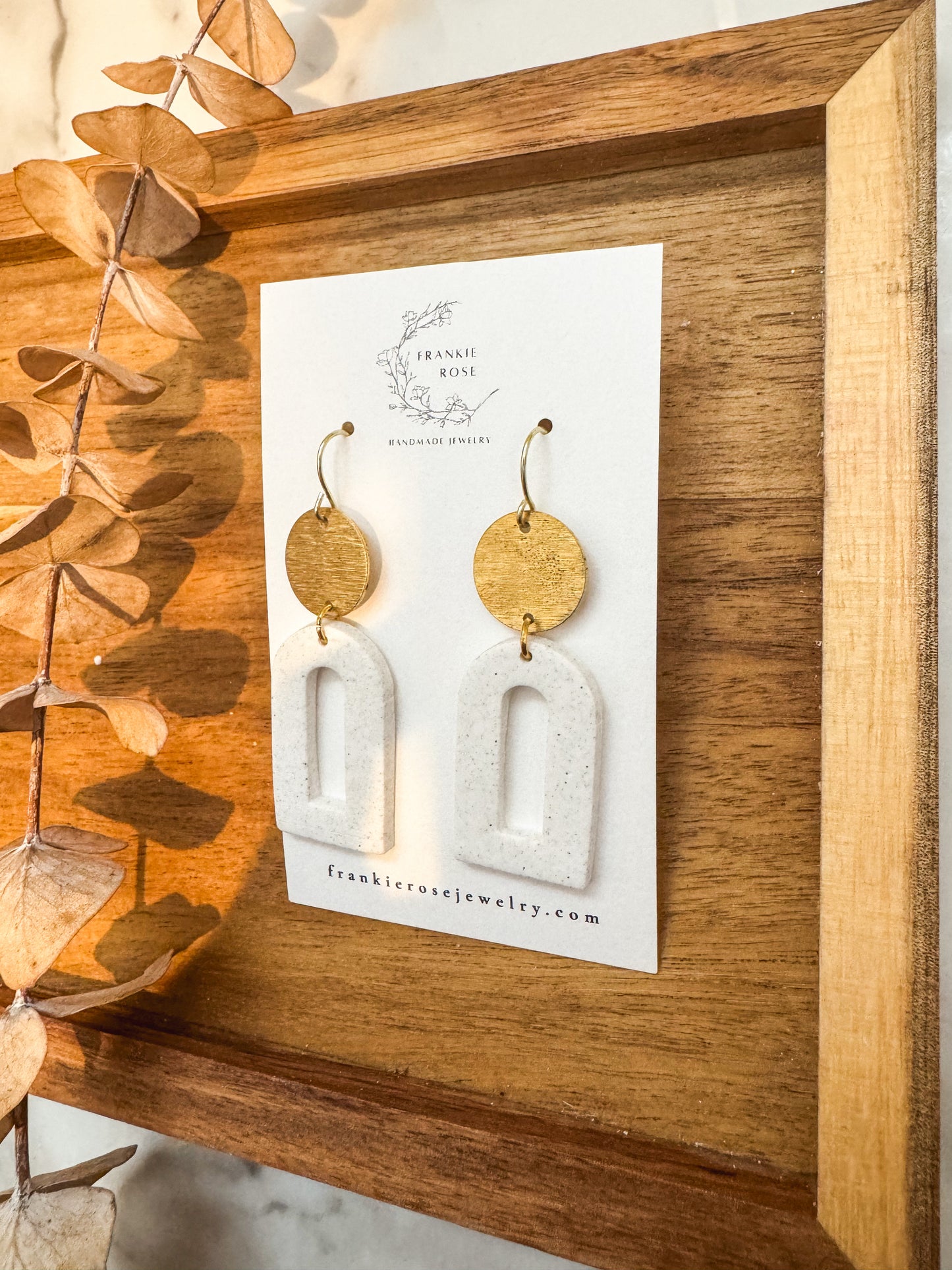 white hallow arch dangles