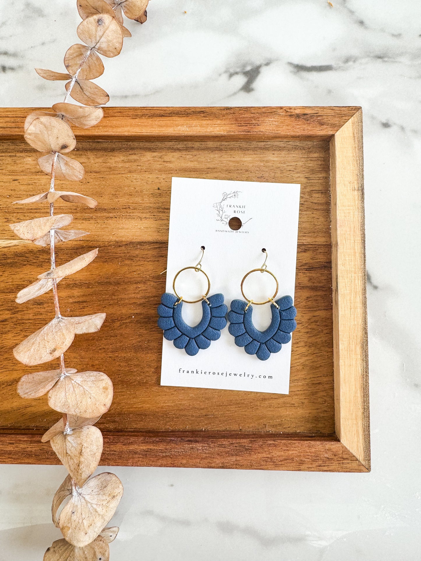 Navy dangle scallops