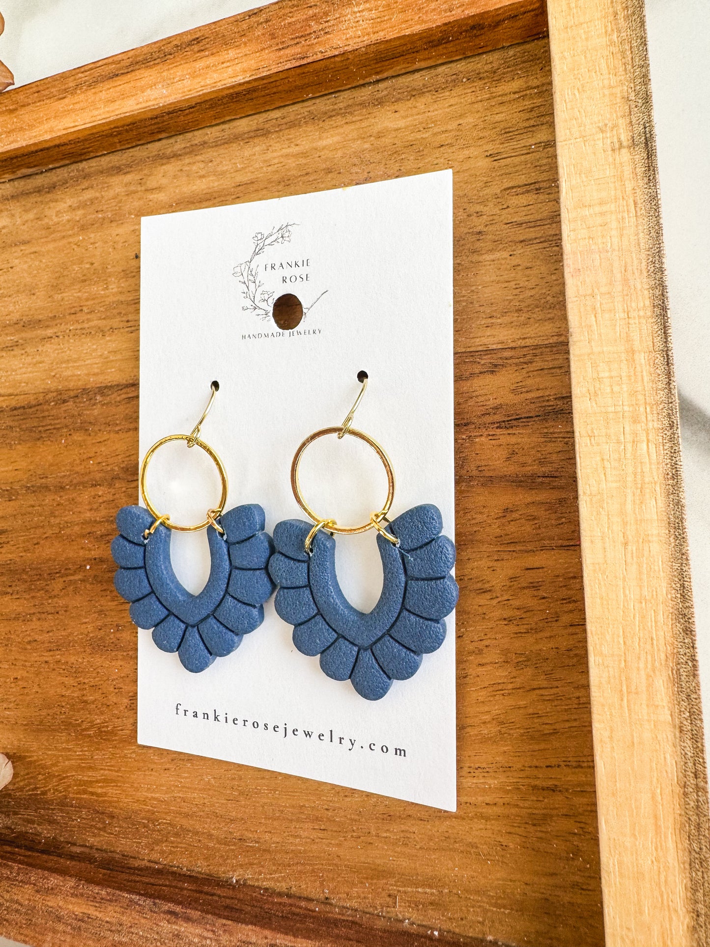 Navy dangle scallops