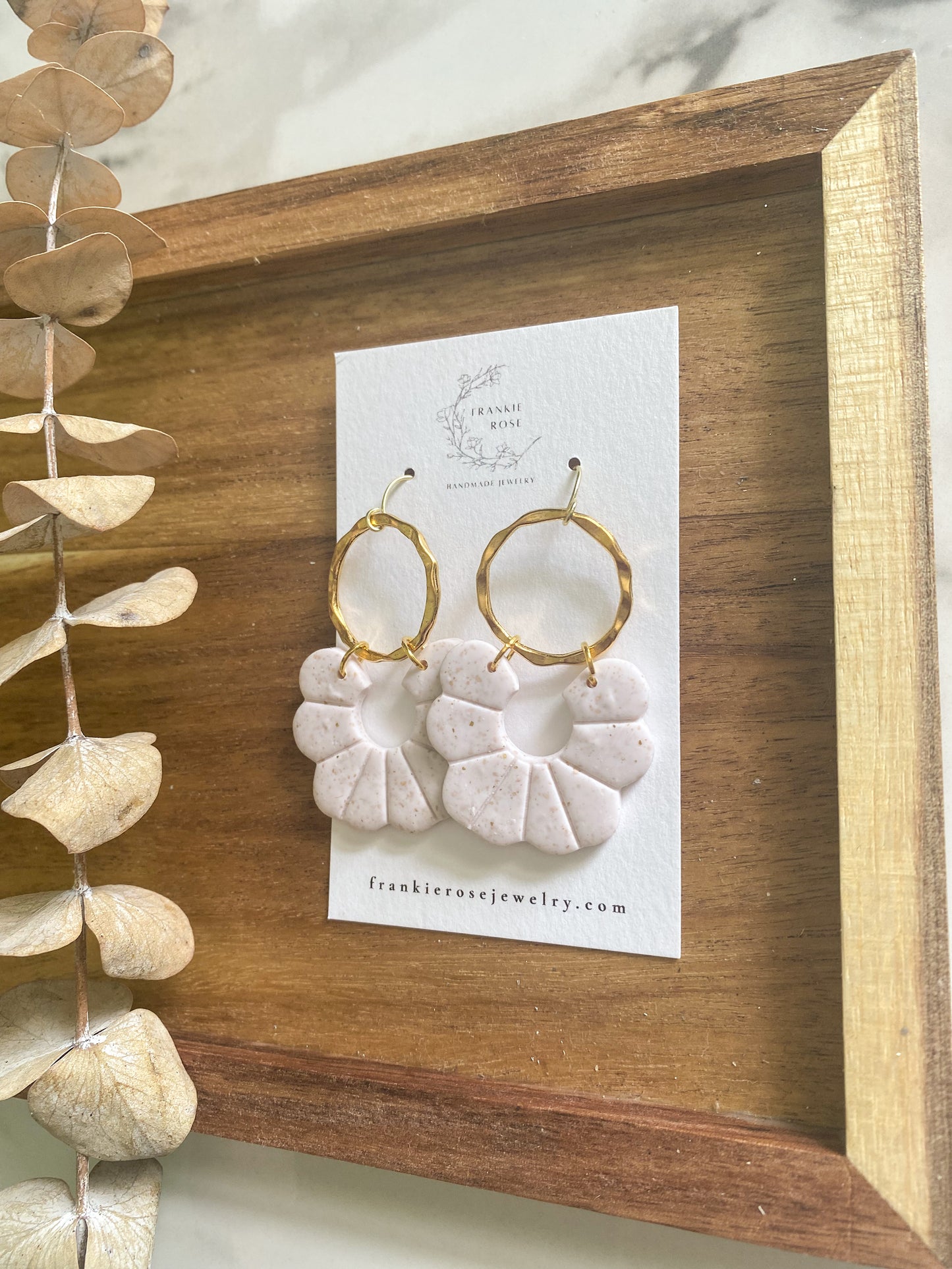 cream and gold floral with brass charm | clay earrings