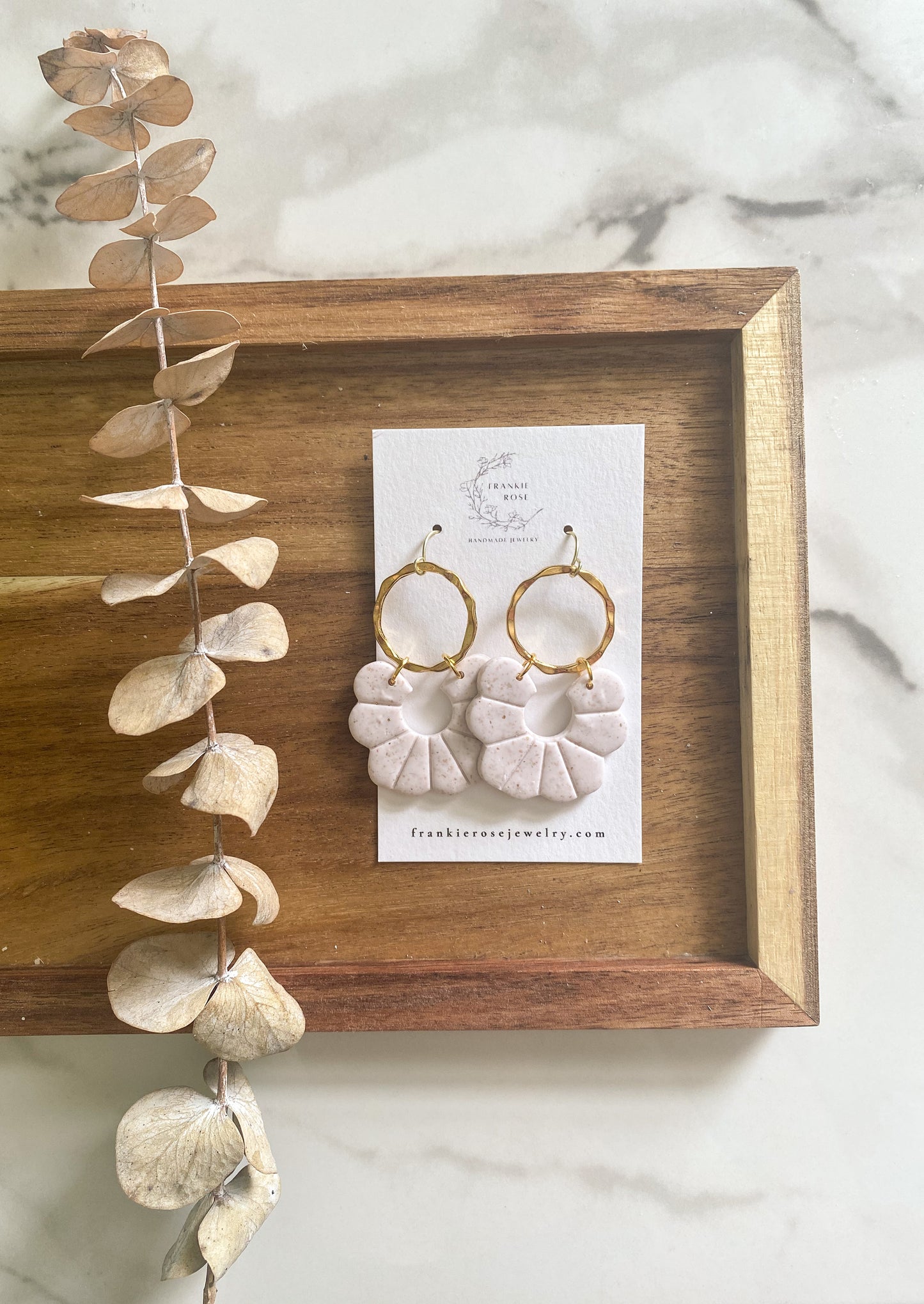 cream and gold floral with brass charm | clay earrings